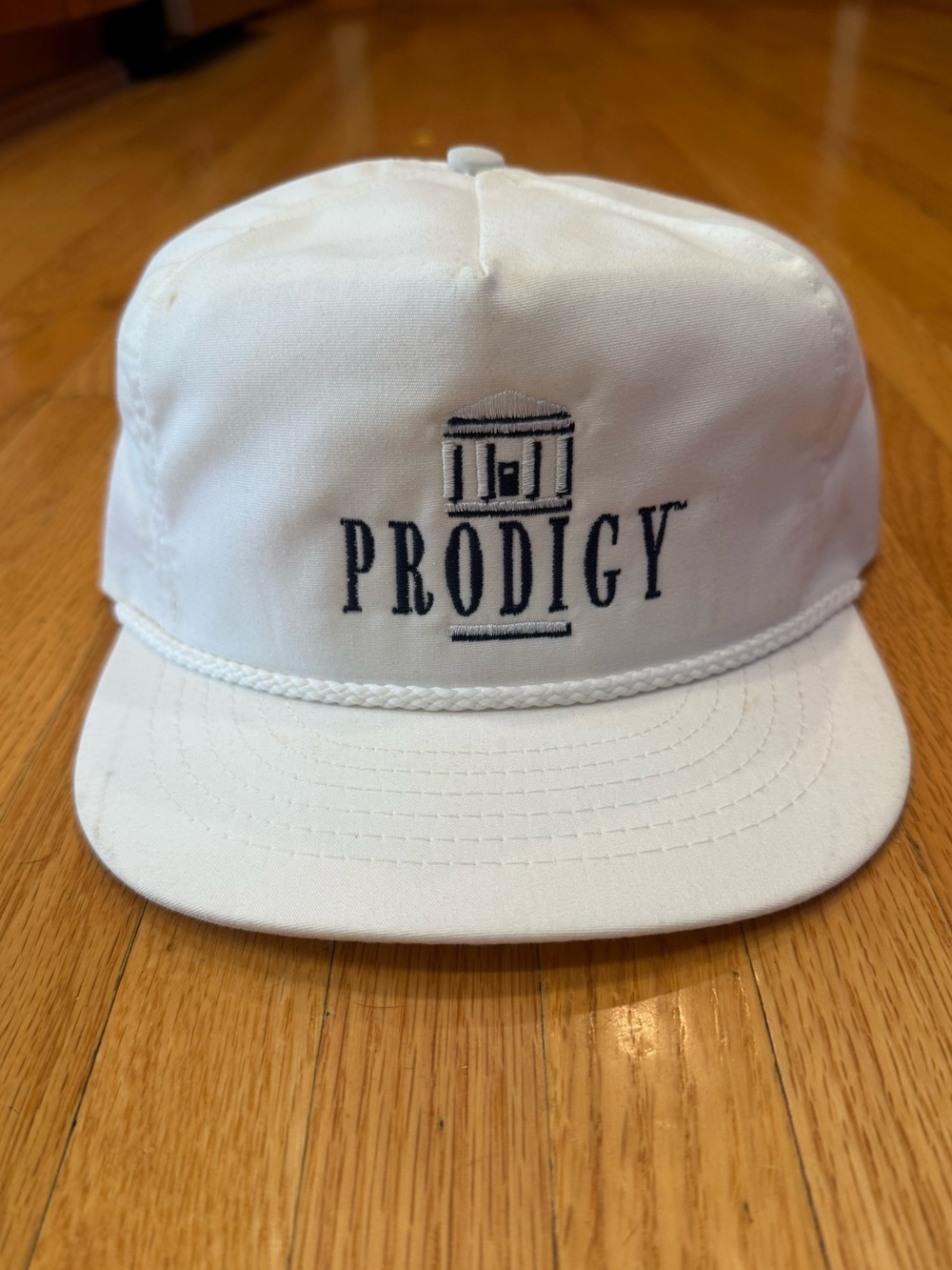 The Prodigy White Rope-Trim Logo Cap